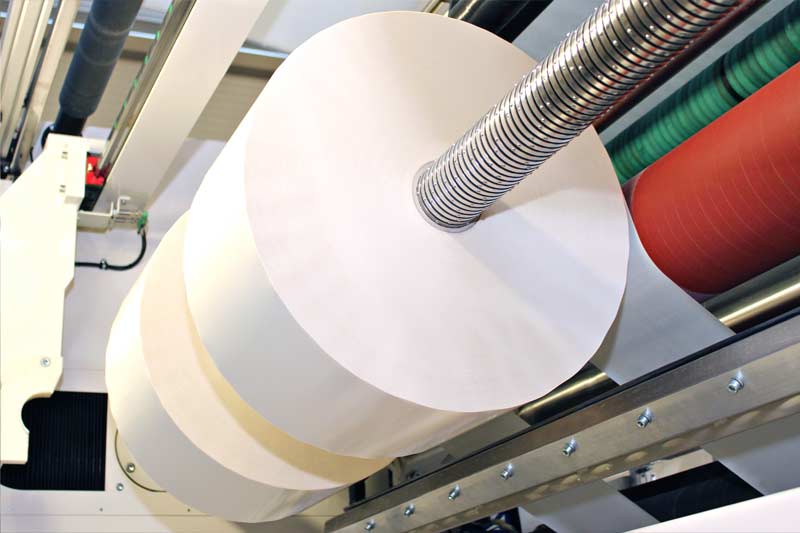 Adhesive tape converting long rolls